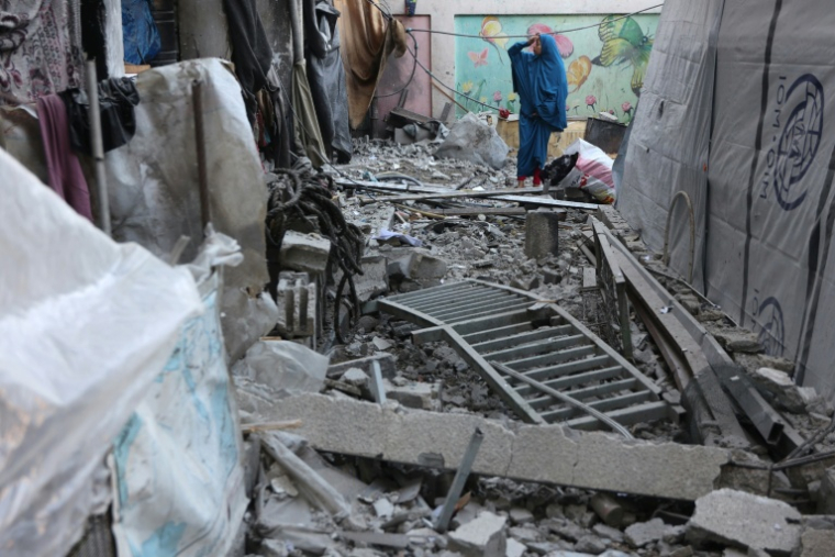 Les dégâts causés par une frappe israélienne sur l'école Moussa Ben Nousseir, dans la ville de Gaza le 22 décembre 2024 ( AFP / Omar AL-QATTAA )