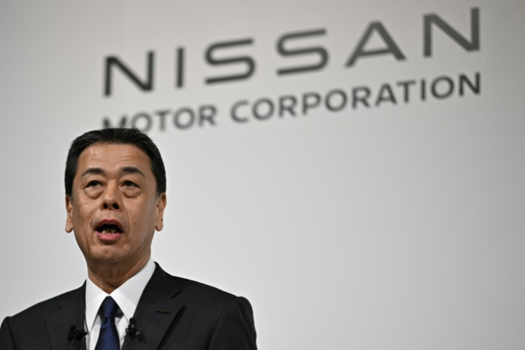 Makoto Uchida, le patron de Nissan, lors d'une conférence de presse à Tokyo, le 23 décembre 2024, avec ses homologues de Honda et Mitsubishi Motors ( AFP / Philip FONG )