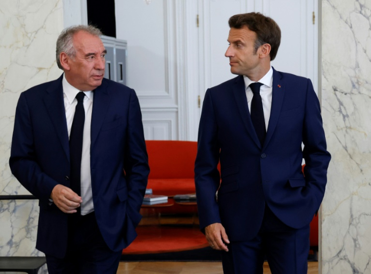 François Bayrou et Emmanuel Macron le 21 juin 2022 à l'Elysée à Paris ( POOL / Ludovic MARIN )